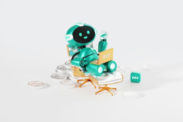 little green smiling robot using a laptop