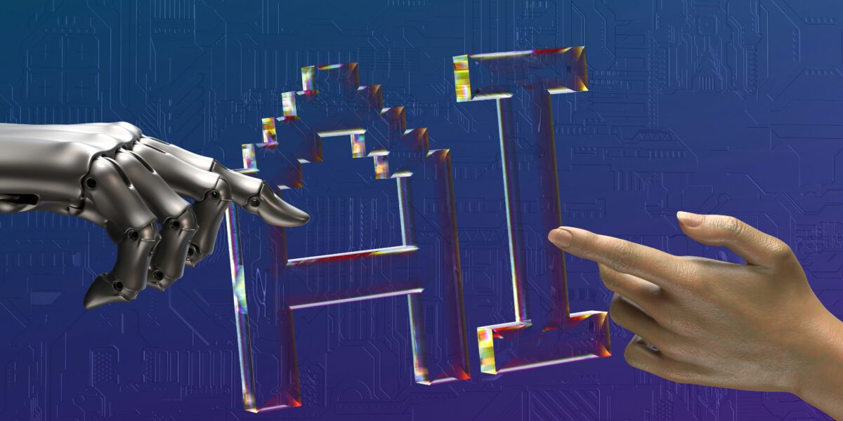 The letters "AI" with a human hand a robot hand pointing at it.