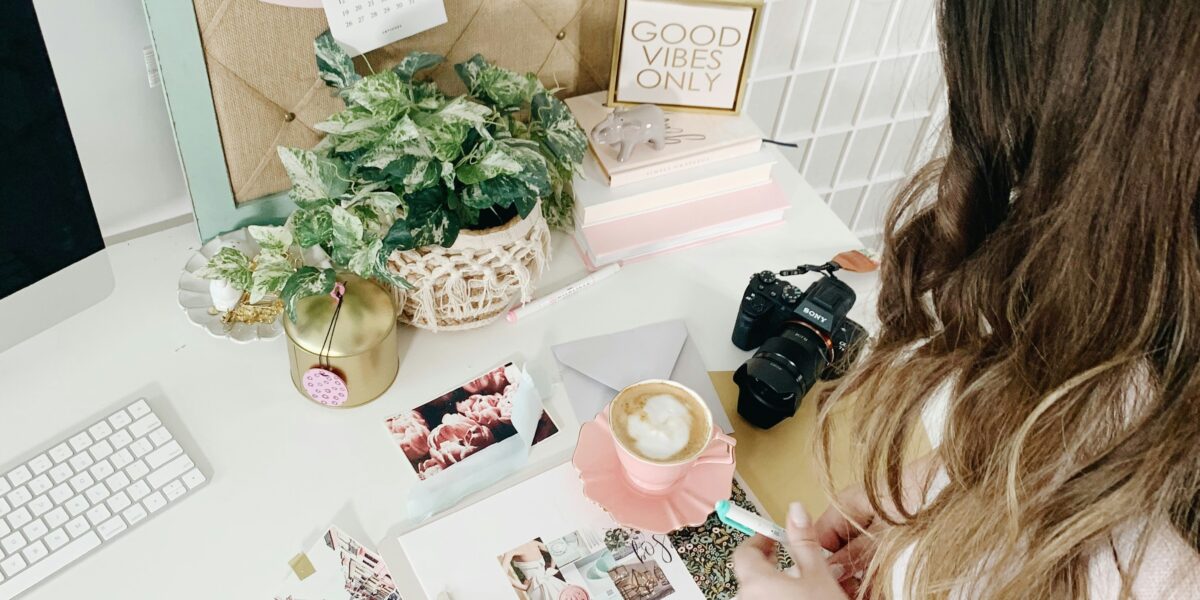 girl surrounded by items that make up a personal brand image
