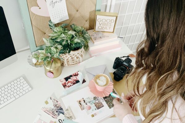 girl surrounded by items that make up a personal brand image