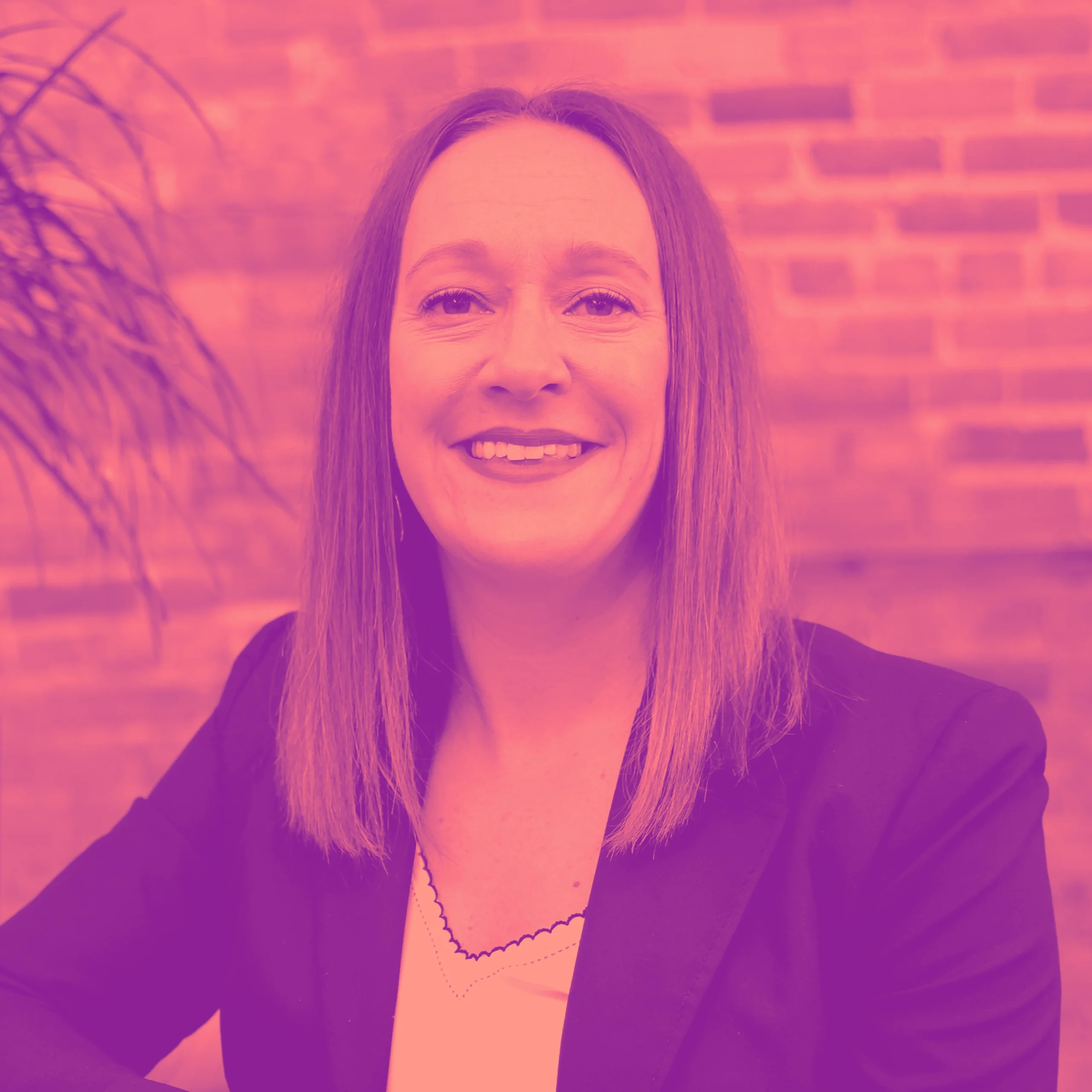 Jen_M_Duo Professional headshot of woman in dark blazer with pink-magenta duotone treatment