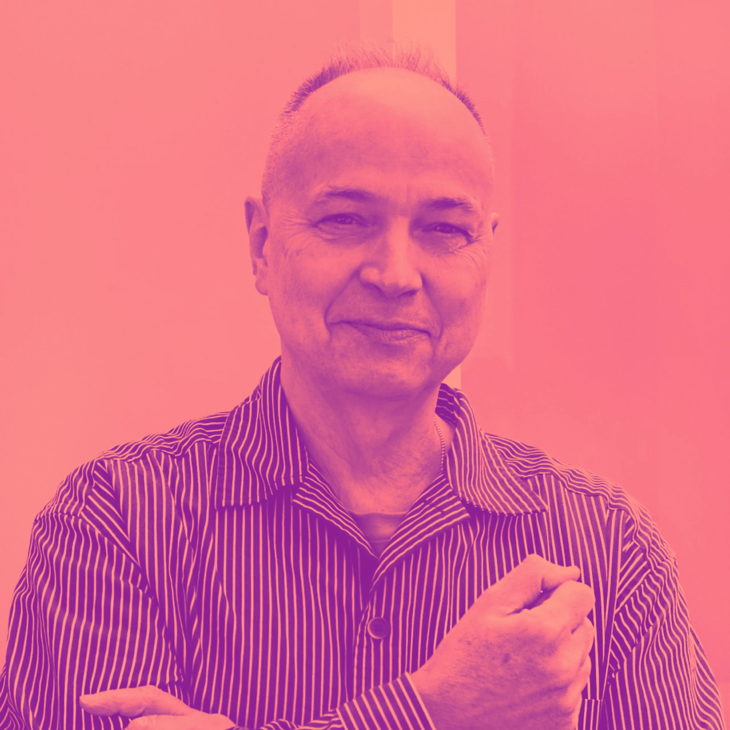 Keith_H_Duo Professional headshot of older man with arms crossed and pink-magenta duotone treatment