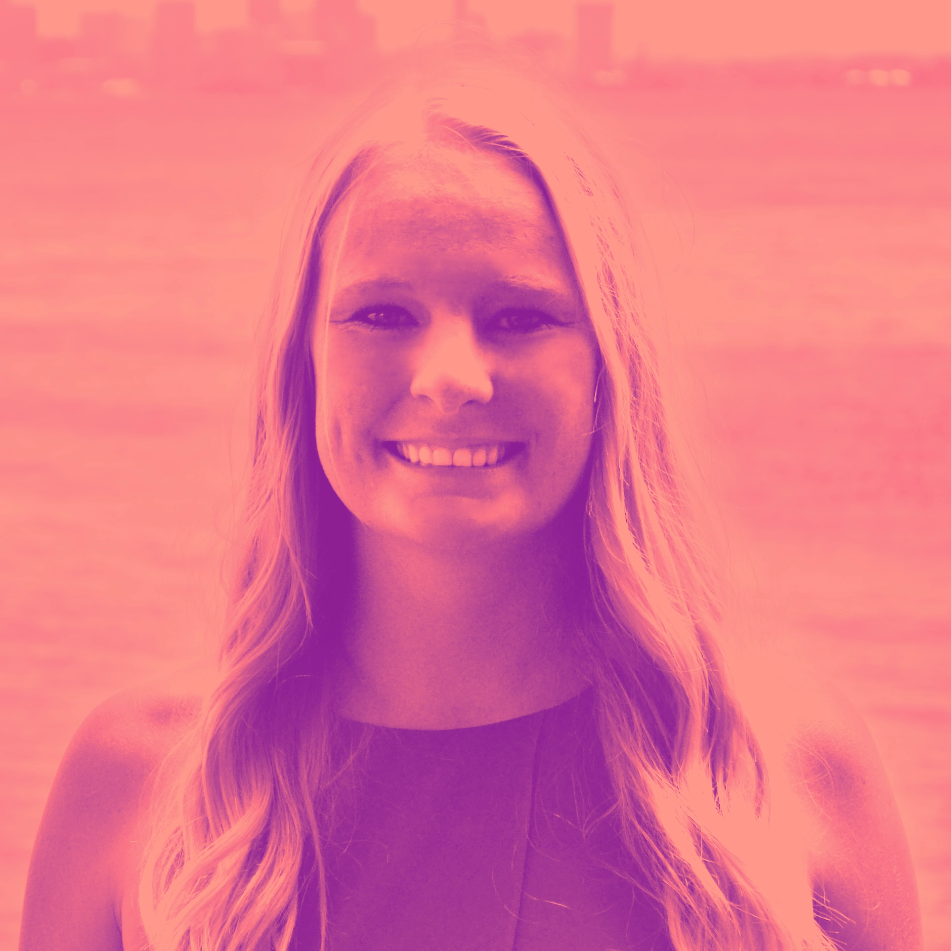 Rachel_L_Duo Professional headshot of woman with blonde hair and waterfront cityscape with pink-magenta duotone treatment